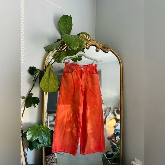 Free people waterfall orange baggy jeans Nwot size 24 /25 short