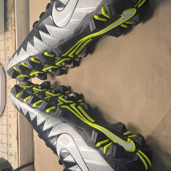 Nike Cleats. Men's Black and White Athletic Shoes