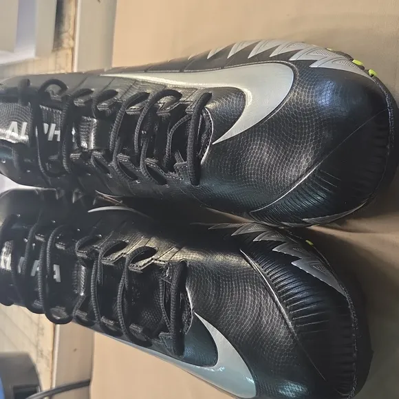 Nike Cleats. Men's Black and White Athletic Shoes