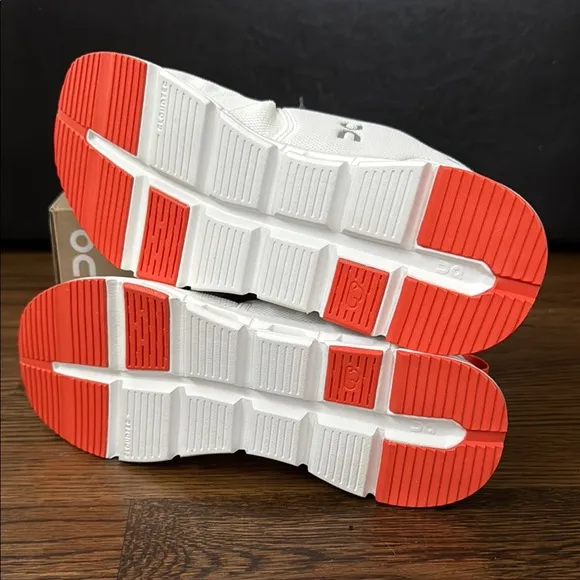 On Running White and Red Sneakers with CloudTec Comfort