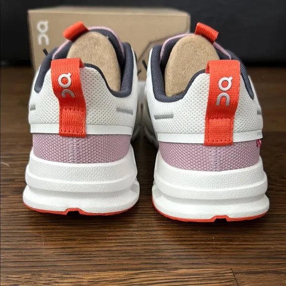 On Running White and Red Sneakers with CloudTec Comfort