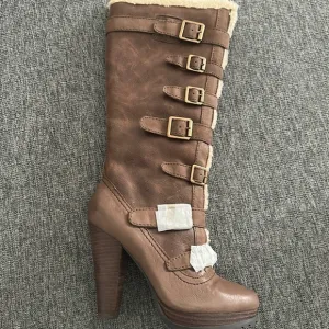 Report Knee High Boots