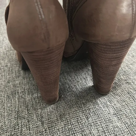 Report Knee High Boots
