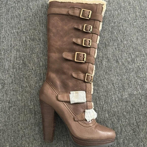Report Knee High Boots