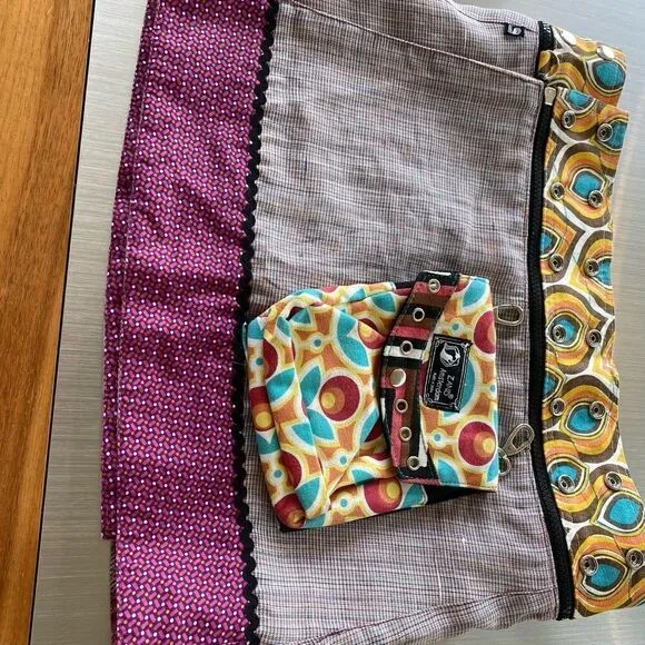 Zane Amsterdam reversible wrap miniskirt with detachable purse. Fits any size.