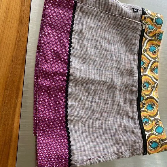 Zane Amsterdam reversible wrap miniskirt with detachable purse. Fits any size.
